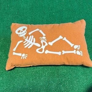 Orange Skeleton pillow! (Some strings showing in corners and lower front)
